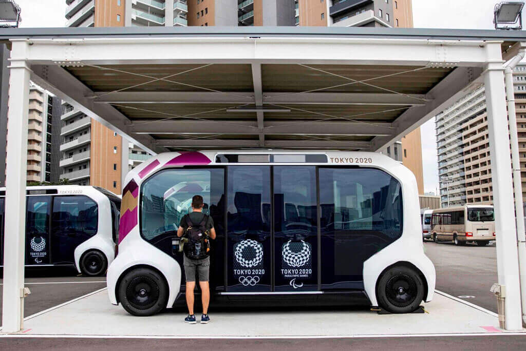 image showing the tokyo olympics 2020 using electric cars for the travel for the sustainablity