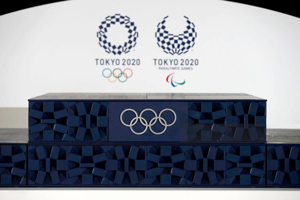 image showing the tokyo olympics 2020 using the plastc podium for giving rewards to winning athletes