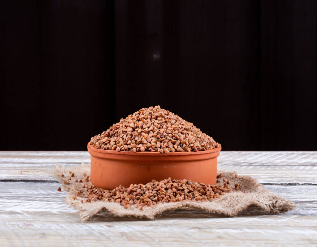 image of buckwheat millet in a wooden bowl